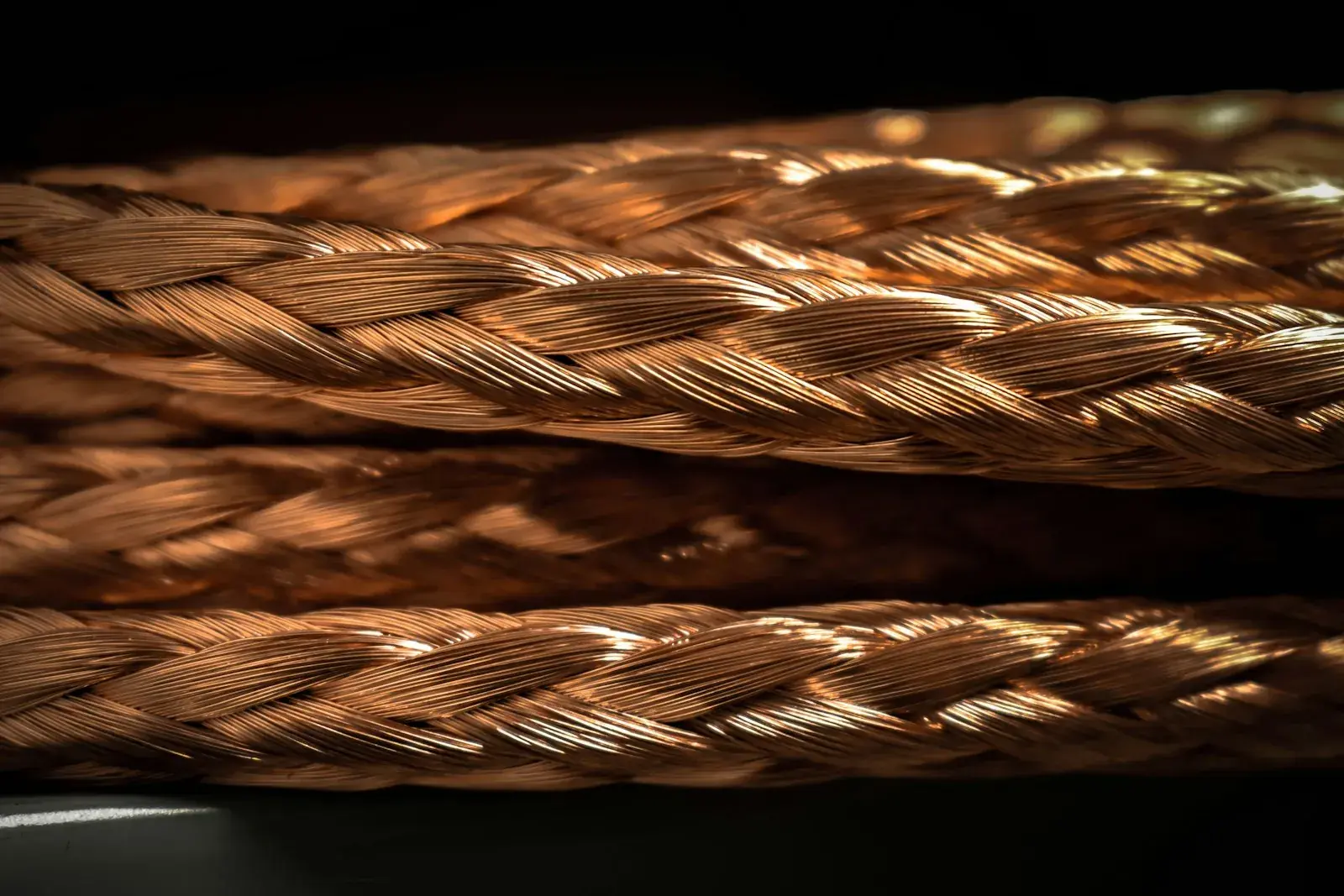 Braided strands of bare copper wire